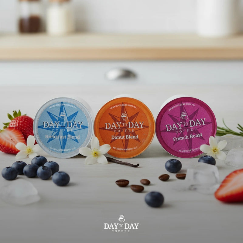 Day to Day Coffee K-Cups displayed with fresh summer add-ins like berries, mint, and ice — perfect for seasonal office coffee